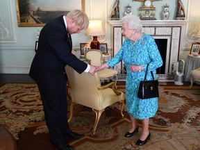 Britain's Queen Elizabeth II welcomes Boris Johnson in Buckingham Palace, London on July 24, 2019, where she invited him to become Prime Minister and form a new government.