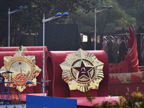 A float featuring the emblem of China's People's Liberation Army (C) is seen in Beijing on September 28, 2019.