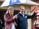 Federal Conservative Leader Andrew Scheer and his wife Jill leave a campaign event in Surrey, B.C.