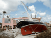 A sailboat lies stranded on land after Hurricane Dorian hit the Abaco Islands in Treasure Cay, Bahamas.