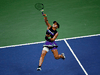 Bianca Andreescu of Canada hits a return against Elise Mertens of Belgium in their quarterfinal match at the 2019 U.S. Open, Sept. 4, 2019.