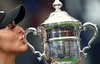 Bianca Andreescu of Canada kisses the championship trophy following her U.S. Open victory.