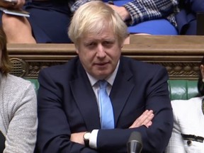 Britain's Prime Minister Boris Johnson is seen after BritainÕs parliament voted on whether to hold an early general election, in Parliament in London, Britain, September 10, 2019, in this still image taken from Parliament TV footage.