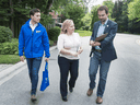 Mississauga Lakeshore Conservative candidate Stella Ambler, centre, on the door-knocking campaign trail with Nick Switalski, right, and her son Ben.