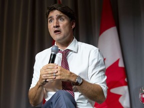 Prime Minister Justin Trudeau attends a Liberal Party fundraising event alongside Liberal MP Marco Mendicino in Toronto on Wednesday, September 4, 2019. Trudeau says China uses arbitrary detentions as a tool to achieve its international and domestic political goals.THE CANADIAN PRESS/Chris Young