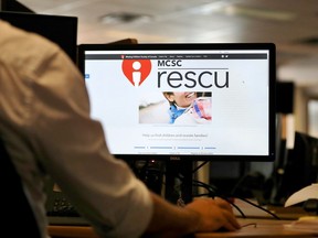 A new website from the Missing Children Society of Canada is seen on a computer in Toronto on Friday, Sept. 6, 2019. The site, at rescu.mcsc.ca, aims to provide timely information about missing children by region, and allows users to provide tips or receive text alerts.