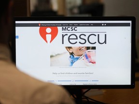 A new website from the Missing Children Society of Canada is seen on a computer in Toronto on Friday, Sept. 6, 2019. The site, at rescu.mcsc.ca, aims to provide timely information about missing children by region, and allows users to provide tips or receive text alerts.