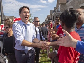 Liberal leader Justin Trudeau greets supporters while campaigning Sunday, September 22, 2019 in Brampton, Ontario. Conservative Leader Andrew Scheer and Liberal rival Justin Trudeau are each hoping to discover a bountiful crop of support as they focus today's federal campaign efforts on the densely populated suburbs north of Toronto and the rest of the so-called Golden Horseshoe.