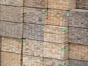 Softwood lumber is pictured along the Fraser River in Richmond, B.C., Tuesday, April 25, 2017. A joint NAFTA panel has given the United States three months to come up with a new softwood lumber determination on Canadian imports.