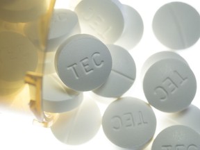 Prescription pills containing oxycodone and acetaminophen are shown in Toronto, Dec. 23, 2017. Newly released documents show Health Canada is looking to use an emerging financing model to use private sector dollars to fight opioid addiction because "conventional efforts are not enough" to address the national health crisis.
