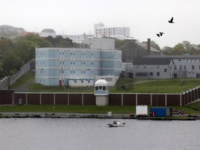 Her Majesty's Penitentiary, a minimum security penitentiary in St. John's, NL, overlooks Quidi Vidi Lake on June 9, 2011. The families of two inmates who died in Newfoundland jails have filed lawsuits claiming negligence by the province exacerbated their loved ones' mental health conditions and led to their untimely deaths. TE CANADIAN PRESS/Paul Daly