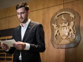 Port Moody Mayor Rob Vagramov reads a statement during a news conference after being charged with sexual assault, at City Hall in Port Moody, B.C., on Thursday March 28, 2019. A sexual assault case involving the mayor of Port Moody, B.C., will return to court on Nov. 13, but the politician's lawyer says "alternative measures" are being pursued that could see it resolved outside court.