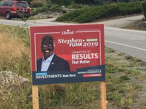 Campaign signs for a Liberal candidate in British Columbia have been vandalized with black colouring in the wake of an old photo surfacing that shows party leader Justin Trudeau wearing brownface. A photo of one of the damaged signs in Kelowna, B.C. is shown in a handout photo. THE CANADIAN PRESS/HO-Facebook-Stephen Fuhr CD MANDATORY CREDIT