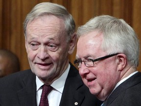 Former prime ministers Jean Chretien and Joe Clark chat following the installation ceremony David Johnston as Canada's 28th Governor General in the Senate on Parliament Hill, Friday, Oct. 1, 2010, in Ottawa. Former prime ministers Chretien and Clark are helping represent Canada at the United Nations General Assembly as the Trudeau government takes a pass during the federal election campaign.THE CANADIAN PRESS/Fred Chartrand