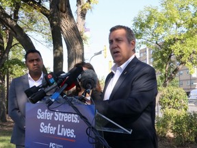 Spruce Woods Progressive Conservative candidate Cliff Cullen speaks during an announcement outside the Health Sciences Centre, in Winnipge on Thursday, Aug. 22, 2019. Manitoba's government is directing the police commission to find ways to make downtown Winnipeg safer.