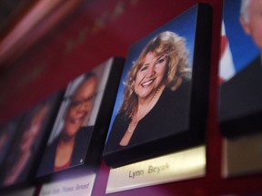 A picture of Senator Lynn Beyak accompanies other Senators official portraits on a display outside the Senate on Parliament Hill in Ottawa on Thursday, Sept. 21, 2017. Racist letters about Indigenous People have finally been removed from Sen. Beyak's website ??? but only because Senate officials erased them after Beyak refused to do so herself.THE CANADIAN PRESS/Sean Kilpatrick