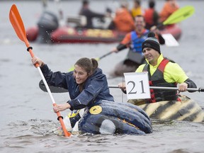 Local resident Kaitlyn Enders races her giant pumpkin in the 19th annual Windsor-West Hants Pumpkin Festival regatta on Lake Pisiquid in Windsor, N.S., on Sunday, October 15, 2017.