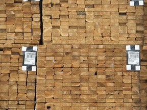 Fresh cut lumber is pictured stacked at a mill along the Stave River in Maple Ridge, B.C. Thursday, April 25, 2019.