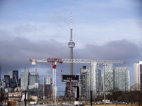 The CN Tower can be seen in the Toronto skyline in Toronto, Ontario on Tuesday, April 25, 2017. Chambers of commerce from Canada's biggest cities will release a campaign wish list Wednesday urging political parties to commit to establishing national data-governance standards, making government research more available for businesses and fully harnessing the value of intellectual property.