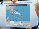 U.S. President Donald Trump references a map while talking to reporters regarding Hurricane Dorian at the White House on Sept. 04, 2019. The map was a forecast from August 29 that appears to have been altered by a black marker to extend the hurricane's range to include Alabama.