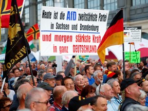 Supporters of the anti-Islam movement PEGIDA (Patriotic Europeans Against the Islamisation of the West) gather following the federal state elections of Saxony during a demonstration at the main railway station of Dresden, Germany, September 2, 2019.