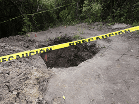 A mass grave found in Pueblo Viejo, in the outskirts of Iguala, Guerrero state, Mexico, on Oct. 6, 2014.