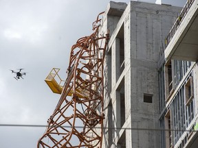 A drone flown by Halifax Regional Fire and Emergency records the damaged crane as they investigate potential fire hazards in Halifax on Friday, Sept. 13, 2019. The building crane toppled in heavy winds and driving rain as hurricane Dorian past through the region.