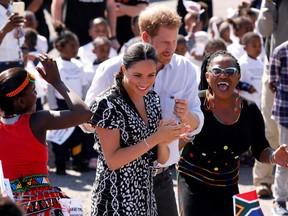 The Duke and Duchess of Sussex, Prince Harry and his wife Meghan, are seen during a Justice Desk initiative in Nyanga township, on the first day of their African tour in Cape Town, South Africa, September 23, 2019.