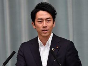 Newly appointed Japanese Environment Minister Shinjiro Koizumi speaks during a press conference at the prime minister's official residence in Tokyo on September 11, 2019.
