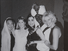 A photo posted online by TIme with the following caption "Justin Trudeau, now the prime minister of Canada, appears in dark makeup on his face, neck and hands at a 2001 "Arabian Nights"-themed party at the West Point Grey Academy, the private school where he taught."