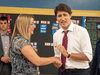 Liberal Leader Justin Trudeau stopped with teacher Lisa Allison during a campaign stop at Blessed Sacrament Catholic elementary school in London, Ont.