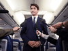 Justin Trudeau speaks to reporters on his campaign plane.