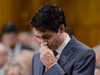 Prime Minister Justin Trudeau pauses while making a formal apology to LGBTQ2 individuals harmed by federal government actions and policies in Canada, in the House of Commons, Nov.28, 2017.