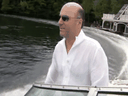 A video grab of Kevin O'Leary in a boat on Lake Joseph, Ontario.