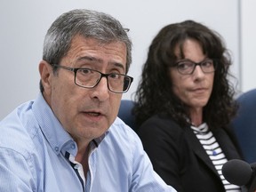 Cesur Celik, father of Koray Kevin Celik, delivers a statement as Tracy Wing, mother of Riley Fairholm looks on during a news conference in Montreal on Monday, September 16, 2019. The sons of both parents were killed during separate police interventions.