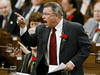 Finance minister Ralph Goodale defends his budget in the House of Commons, May 4, 2005.