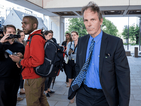 John MacFarlane, senior counsel with the public prosecution service, outside an Ottawa courthouse after addressing media regarding charges against Cameron Ortis, a senior intelligence employee with the RCMP,  Sept. 13, 2019.