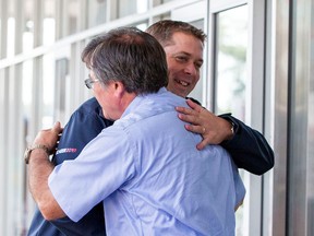 Leader of Canada's Conservatives Andrew Scheer greets Conservative candidate Costas Menegakis, as he campaigns for the upcoming election in Toronto, Ontario, Canada, September 18, 2019.