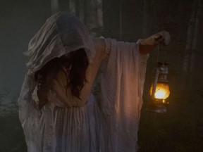 Mayko Nguyen as the Lady In White
in Matthew Currie Holmes’s The
Curse of Buckout Road.