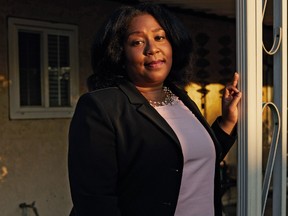 Hanisya Massey, owner of computer training company Higher Ground Enterprises, at her home in West Covina, Calif., Sept. 5, 2019. Massey is in a trademark dispute with former White House occupants Barack and Michelle Obama's Higher Ground Productions.