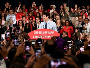 Liberal party supporters and volunteers photograph Canada's Prime Minister Justin Trudeau at a rally launching the election campaign in Vancouver, British Columbia, Canada September 11, 2019.