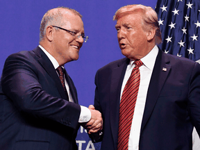 Australian Prime Minister Scott Morrison with U.S. President Donald Trump during a visit to a Pratt Industries plant opening in Ohio on Sept. 22, 2019.