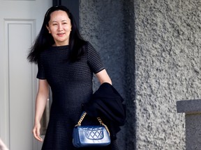 Huawei's financial chief Meng Wanzhou leaves her home in Vancouver on May 8, 2019.