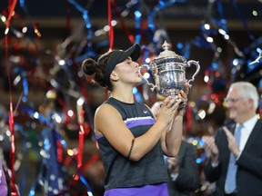 Bianca Andreescu with the championship trophy after winning the Women's Singles final against against Serena Williams at the U.S. Open last year.