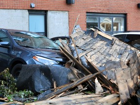 A roof landed on vehicles during Hurricane Dorian is seen in Halifax, Nova Scotia, Canada September 8, 2019.