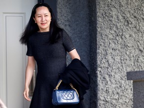 Huawei's Financial Chief Meng Wanzhou leaves her family home in Vancouver, British Columbia, Canada, May 8, 2019.