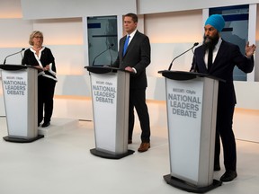 Green Party leader Elizabeth May, Conservative leader Andrew Scheer and New Democratic Party leader Jagmeet Singh take part in the Maclean's/Citytv National Leaders Debate on the second day of the election campaign in Toronto, Ontario, Canada September 12, 2019.