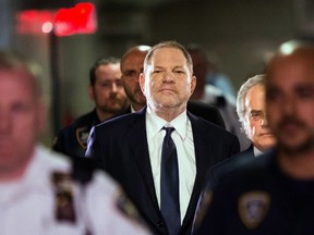 In this file photo taken on June 5, 2018 Hollywood film producer Harvey Weinstein enters Manhattan criminal court in New York.  Harvey Weinstein's lawyers have called on July 17, 2018, for the dismissal of the lawsuit filed by actress Ashley Judd, one of the first to publicly accuse the Hollywood tycoon of sexual harassment, who sued him for derailing her career.