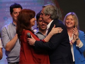 Presidential candidate Alberto Fernandez and his running mate, former President Cristina Fernandez de Kirchner, celebrate after election results in Buenos Aires, Argentina October 27, 2019.