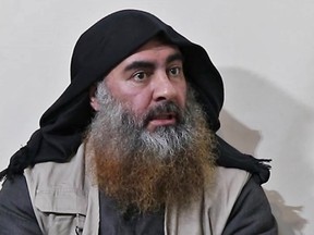 In this undated tv grab taken from a video released by Al-Furqan media, the chief of the Islamic State group Abu Bakr al-Baghdadi purportedly appears for the first time in five years in a propaganda video in an undisclosed location.
